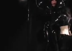 Latex Rubber Mistress and a Slave in Vacbed