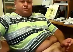 Chunky daddy stroking at office