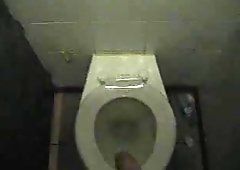Wank and cumshot in motorway toilet