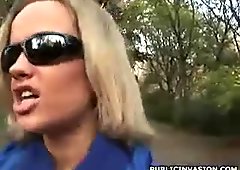 Naughty blonde babe with sunglasses gives blowjob outdoor